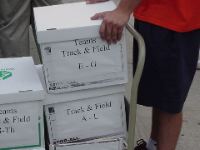 Track and Field Registration Materials moving in