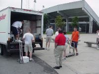 AAU Junior Olympic Games interns unpack the trucks