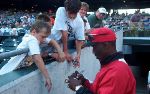 Chet Lemon, former Tiger, signs autographs for the young Tiger fans