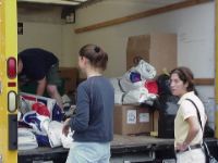 Debbie and Rachel Finishing the Unloading of AAU Truck